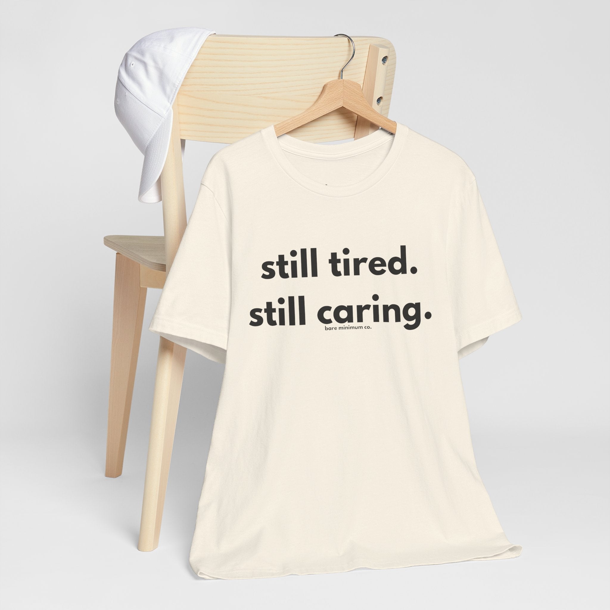 Still Tired. Still Caring. Tee | Bare Minimum Co.